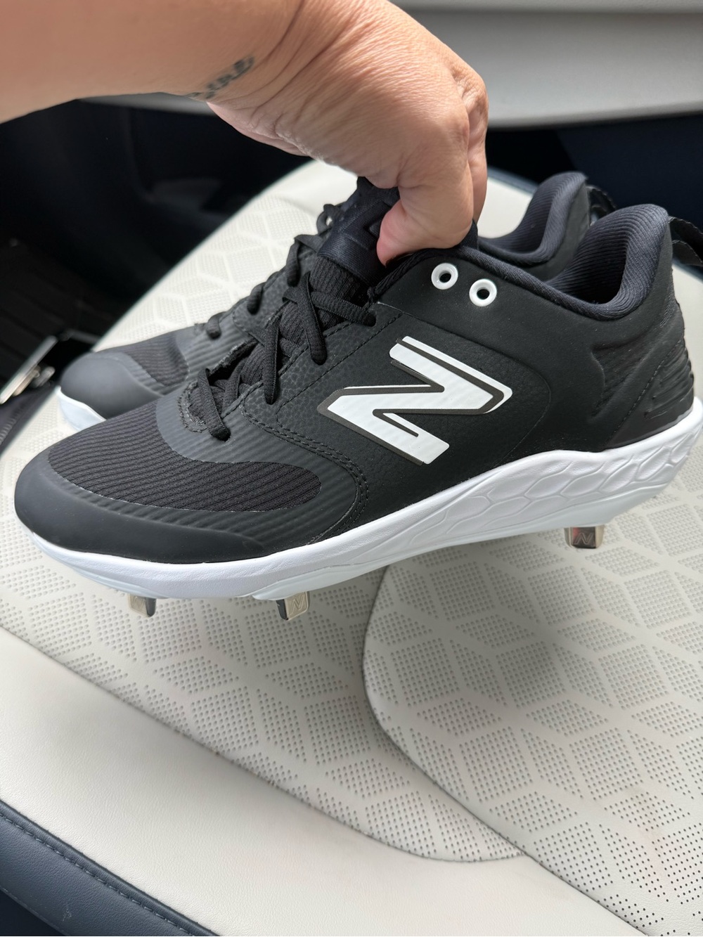 New Balance Black and White Men's Athletic Cleats